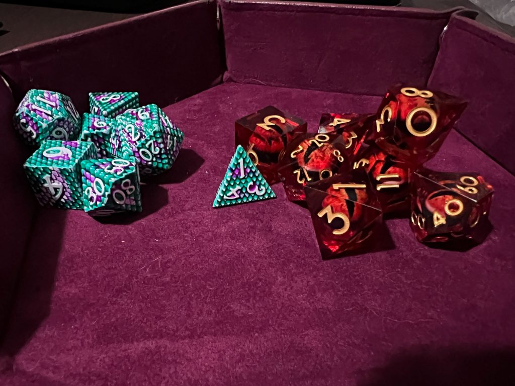 two sets of dice for TTRPGs